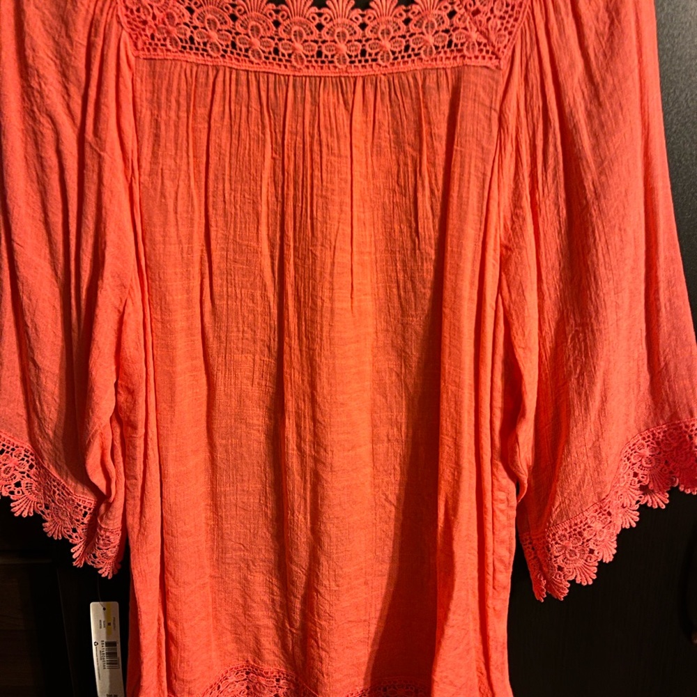 New Direction, Ladies size medium, orange top.